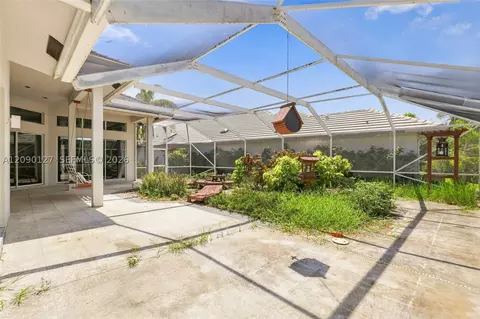 Exterior - 173 Orange Tree Dr, Atlantis, FL 33462 photo 11 of 13