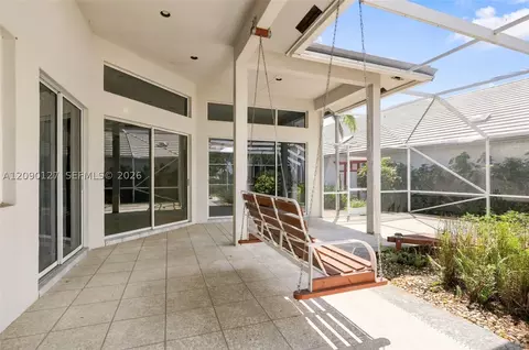 Exterior - 173 Orange Tree Dr, Atlantis, FL 33462 photo 10 of 13