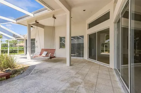 Exterior - 173 Orange Tree Dr, Atlantis, FL 33462 photo 8 of 13