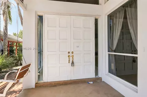 Exterior - 173 Orange Tree Dr, Atlantis, FL 33462 photo 5 of 13