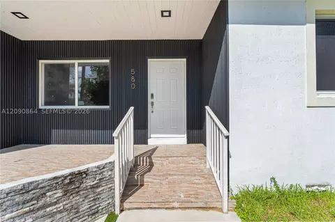 Exterior - 580 Lee Dr, Miami Springs, FL 33166 photo 4 of 10
