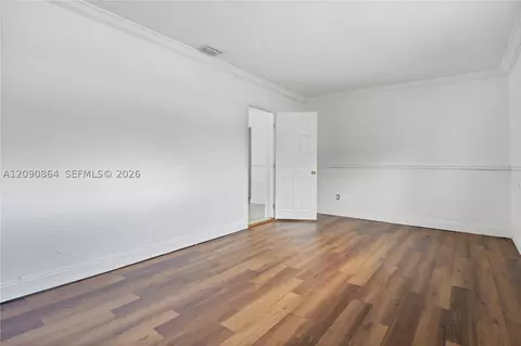 Bedroom - 580 Lee Dr, Miami Springs, FL 33166 photo 6 of 12