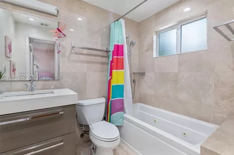 Bath - 9217 Bay Dr, Surfside, FL 33154 photo 2 of 3