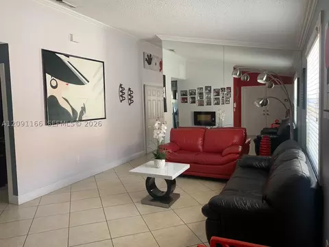 Living - 6940 W 25th Ln, Hialeah, FL 33016 photo 1 of 2