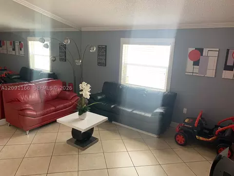 Living - 6940 W 25th Ln, Hialeah, FL 33016 photo 2 of 2