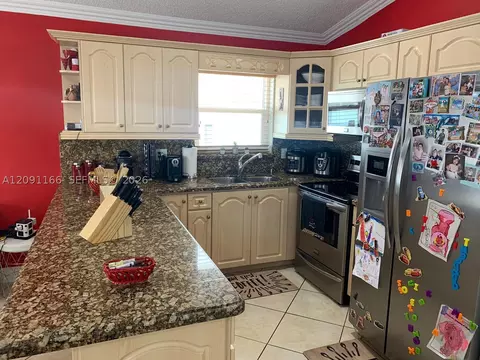 Kitchen - 6940 W 25th Ln, Hialeah, FL 33016 photo 1 of 3