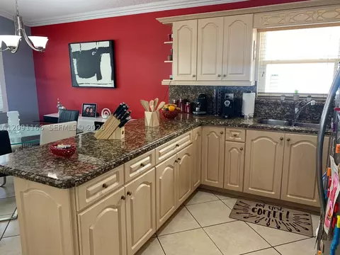 Kitchen - 6940 W 25th Ln, Hialeah, FL 33016 photo 2 of 3