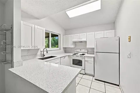 Kitchen - 1301 SE 5th Ct, Dania Beach, FL 33004 photo 2 of 3