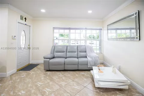 Living - 188 E 59th St, Hialeah, FL 33013 photo 2 of 4
