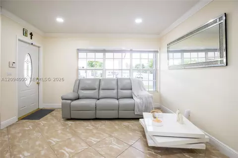 Living - 188 E 59th St, Hialeah, FL 33013 photo 3 of 4
