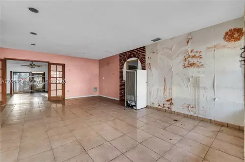 Living - 4730 W 8th Ave, Hialeah, FL 33012 photo 2 of 5