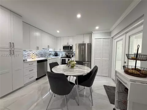 Kitchen - 520 NW 46th St, Pompano Beach, FL 33064 photo 1 of 3