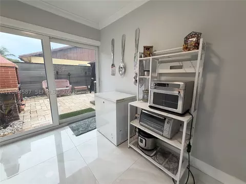 Kitchen - 520 NW 46th St, Pompano Beach, FL 33064 photo 3 of 3