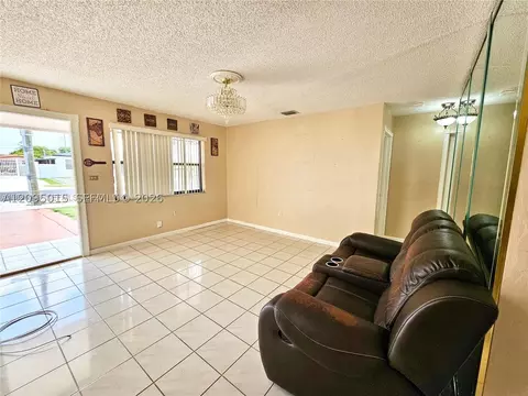 Living - 4596 E 8th Ct, Hialeah, FL 33013 photo 2 of 4