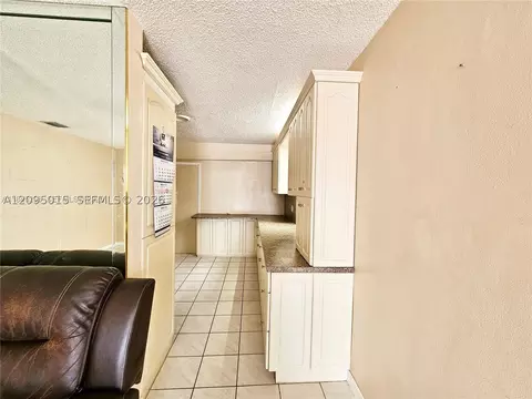 Entry Way - 4596 E 8th Ct, Hialeah, FL 33013 photo 2 of 2