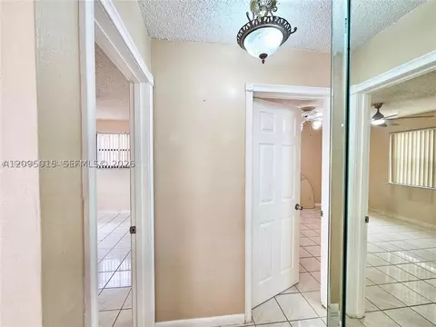 Entry Way - 4596 E 8th Ct, Hialeah, FL 33013 photo 1 of 2