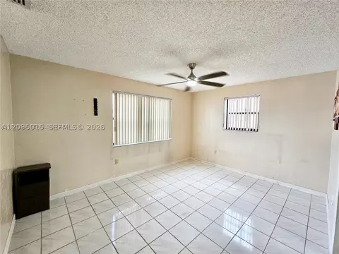 Living - 4596 E 8th Ct, Hialeah, FL 33013 photo 3 of 4