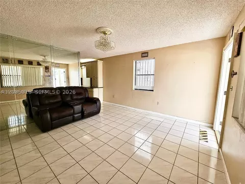 Living - 4596 E 8th Ct, Hialeah, FL 33013 photo 4 of 4