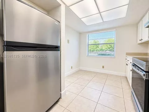 Kitchen - 8982 W Sample Rd #204, Coral Springs, FL 33065 photo 2 of 3