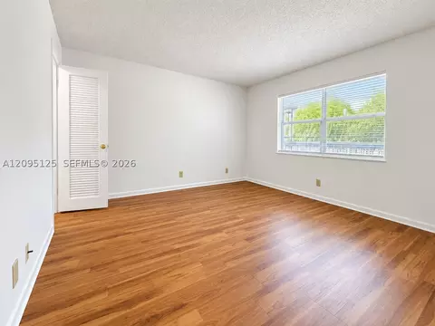 Bedroom - 8982 W Sample Rd #204, Coral Springs, FL 33065 photo 2 of 2