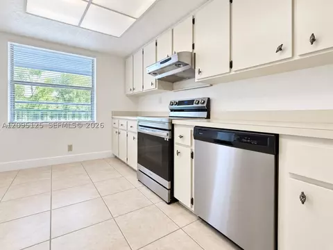 Kitchen - 8982 W Sample Rd #204, Coral Springs, FL 33065 photo 3 of 3