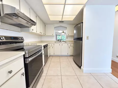 Kitchen - 8982 W Sample Rd #204, Coral Springs, FL 33065 photo 1 of 3