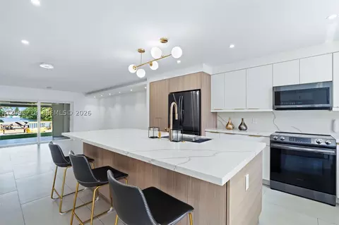 Kitchen - 1369 W 69th St, Hialeah, FL 33014 photo 2 of 3