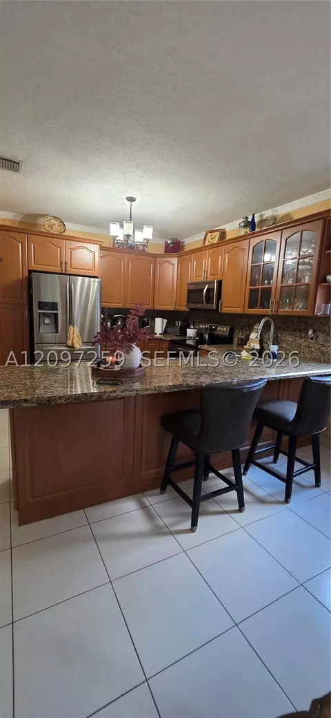 Kitchen - 17665 NW 87th Ct, Hialeah, FL 33018 photo 2 of 3