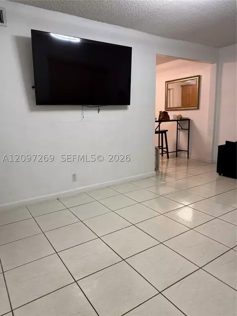 Living - 258 E 46th St, Hialeah, FL 33013 photo 2 of 3