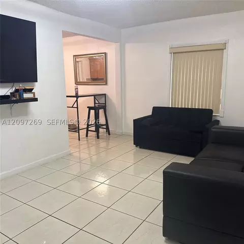 Living - 258 E 46th St, Hialeah, FL 33013 photo 3 of 3