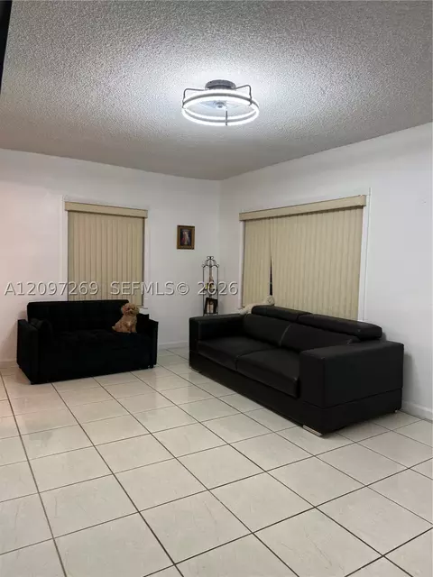 Living - 258 E 46th St, Hialeah, FL 33013 photo 1 of 3