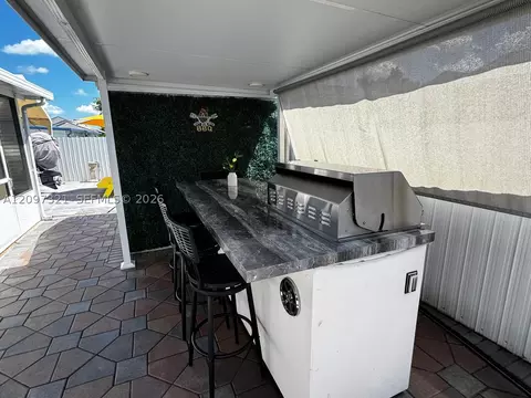 Exterior - 5836 NW 199th St, Hialeah, FL 33015 photo 10 of 12