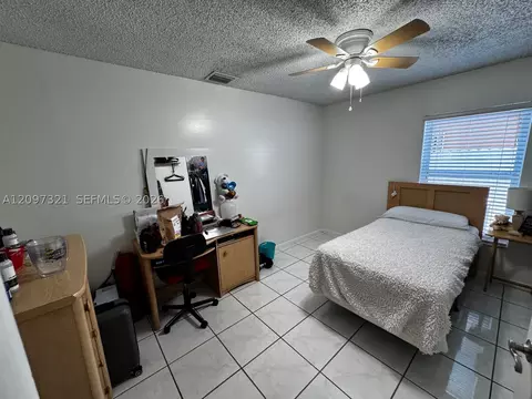 Bedroom - 5836 NW 199th St, Hialeah, FL 33015 photo 2 of 4