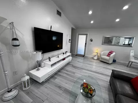 Living - 5836 NW 199th St, Hialeah, FL 33015 photo 2 of 3