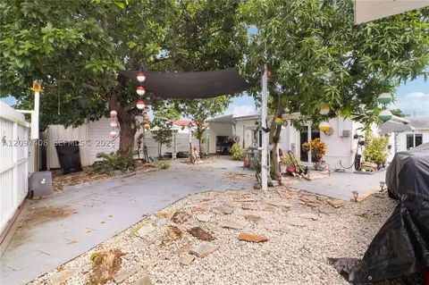 Exterior - 1663 NE 176th St, North Miami Beach, FL 33162 photo 5 of 21
