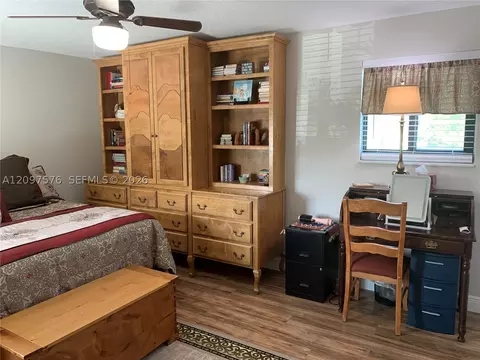Bedroom - 5463 SE Miles Grant Rd #210, Stuart, FL 34997 photo 6 of 9