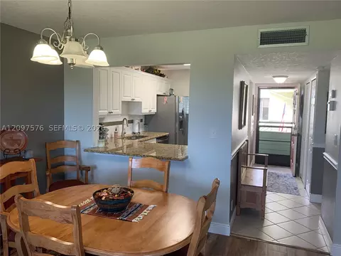 Dining - 5463 SE Miles Grant Rd #210, Stuart, FL 34997 photo 2 of 4