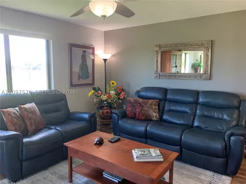 Living - 5463 SE Miles Grant Rd #210, Stuart, FL 34997 photo 2 of 6