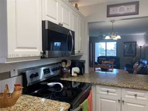 Kitchen - 5463 SE Miles Grant Rd #210, Stuart, FL 34997 photo 2 of 5