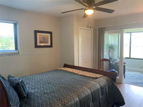 Bedroom - 5463 SE Miles Grant Rd #210, Stuart, FL 34997 photo 2 of 9