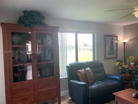 Living - 5463 SE Miles Grant Rd #210, Stuart, FL 34997 photo 4 of 6
