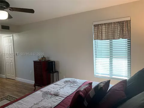 Bedroom - 5463 SE Miles Grant Rd #210, Stuart, FL 34997 photo 9 of 9