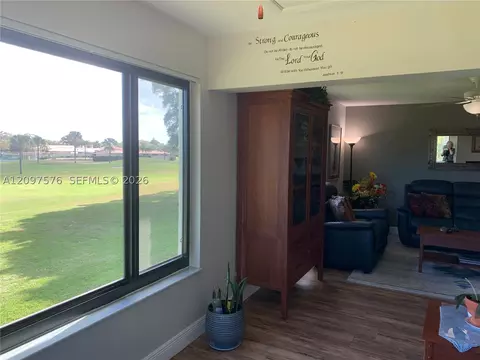 Living - 5463 SE Miles Grant Rd #210, Stuart, FL 34997 photo 5 of 6
