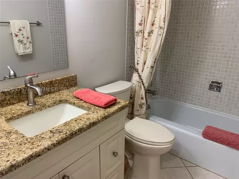 Bath - 5463 SE Miles Grant Rd #210, Stuart, FL 34997 photo 2 of 5