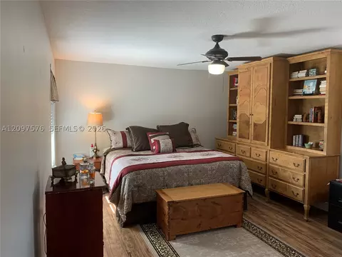 Bedroom - 5463 SE Miles Grant Rd #210, Stuart, FL 34997 photo 4 of 9