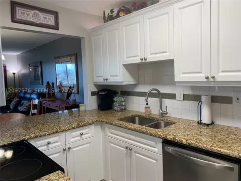 Kitchen - 5463 SE Miles Grant Rd #210, Stuart, FL 34997 photo 1 of 5