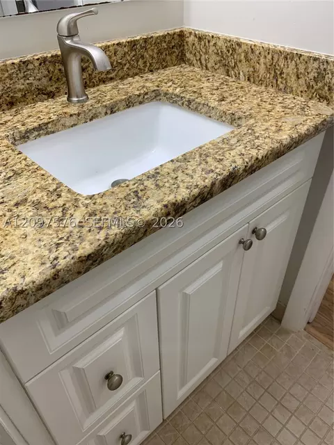 Bath - 5463 SE Miles Grant Rd #210, Stuart, FL 34997 photo 5 of 5