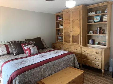 Bedroom - 5463 SE Miles Grant Rd #210, Stuart, FL 34997 photo 7 of 9