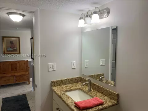 Bath - 5463 SE Miles Grant Rd #210, Stuart, FL 34997 photo 1 of 5