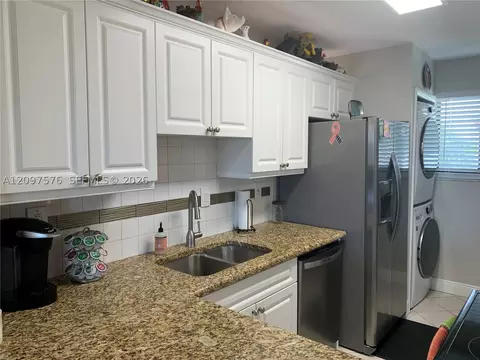 Kitchen - 5463 SE Miles Grant Rd #210, Stuart, FL 34997 photo 4 of 5